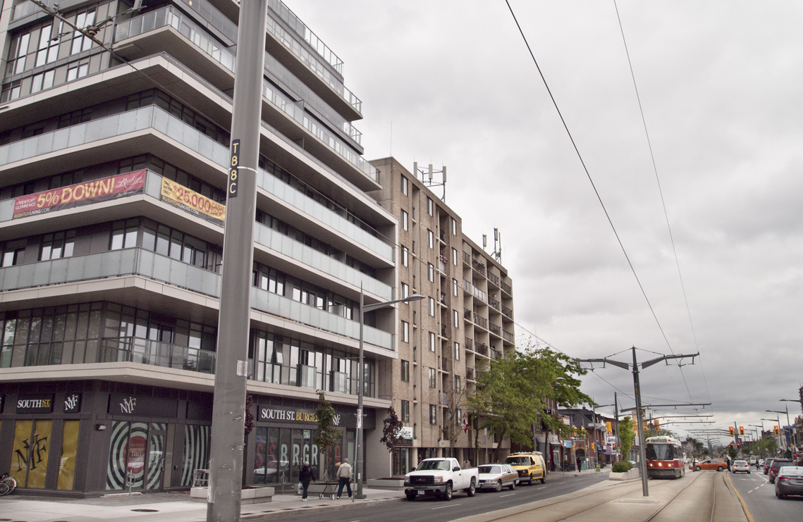 Midrise St. Clair streetscape with streetcar.