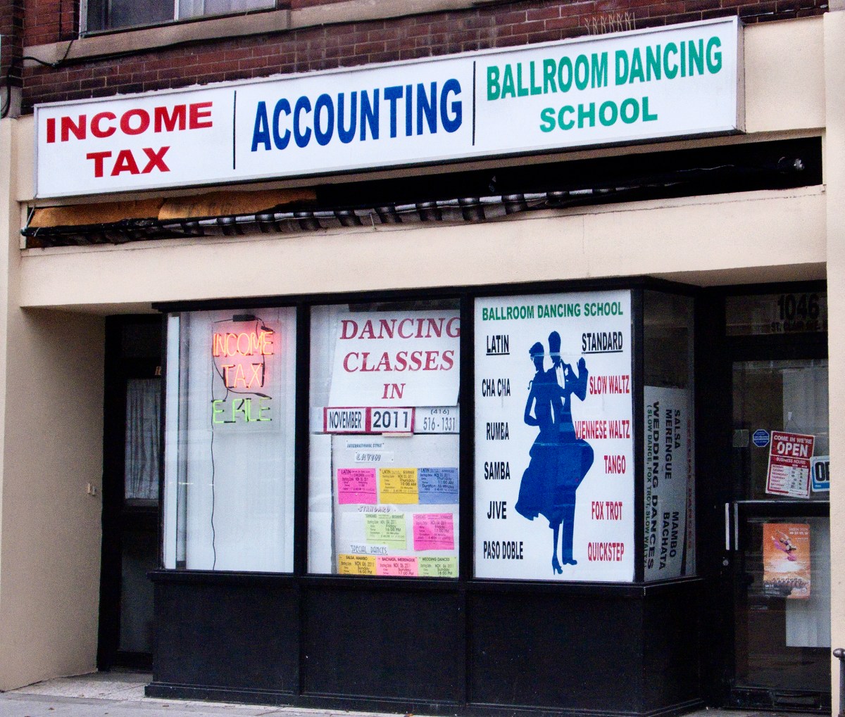 Tax and dance storefront.