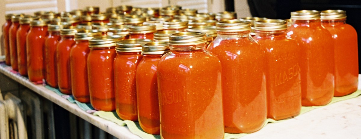 Homemade tomato sauce in glass jars.