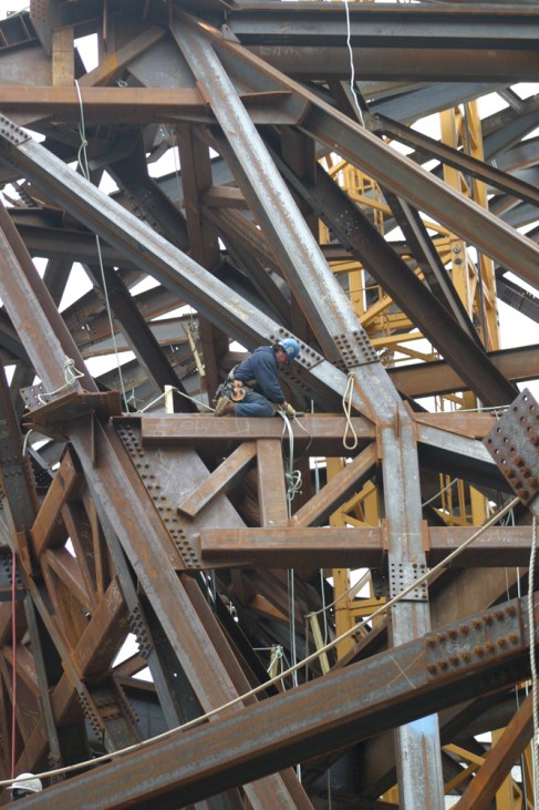 Ironworker on construction of the addition to the ROM.