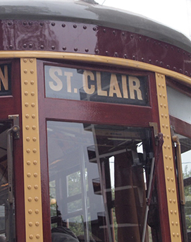 Old streetcar with St. Clair sign in window.