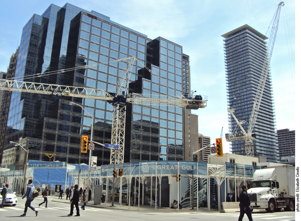 Swinging cranes Bloor and Yonge.