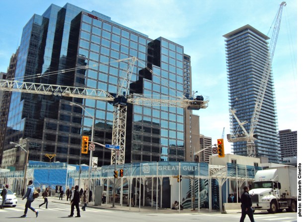 Swinging cranes Bloor and Yonge.