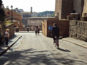 Roman mayor riding bike