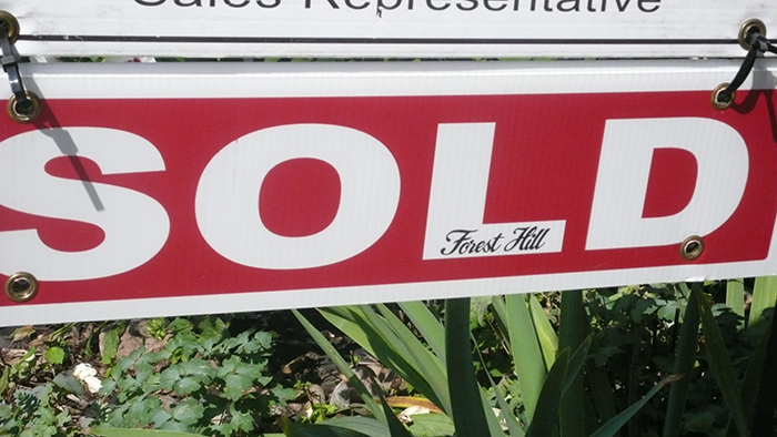 Sold sign.