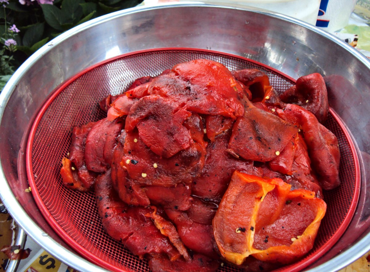 Peeled peppers draining.