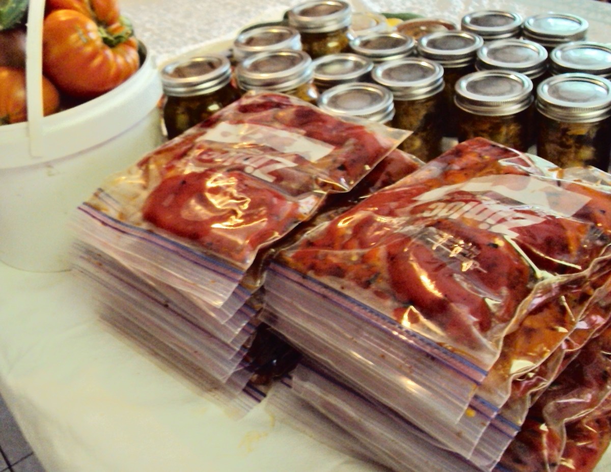 Bagged peppers stacked on table.