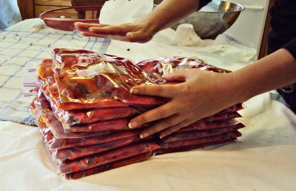 Piling the bags of peppers.