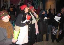 Group of befanas singing.