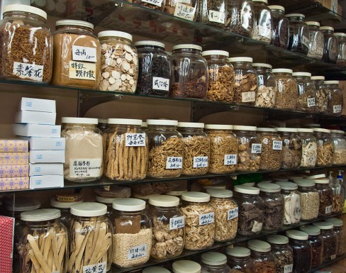 Jars of Chinese herbs in store.