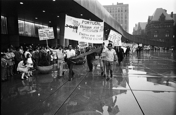 Anti-fascist and anti-colonial protest by PCDA members on Nathan Pillips Square, during Toronto's Portugal Day celebration on June 14, 1971. Photo by Russell, York University Libraries, Clara Thomas Archives & Special Collections, Toronto Telegram fonds, F0433, ASC08245.