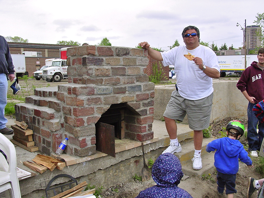 Enjoying the pizza oven.