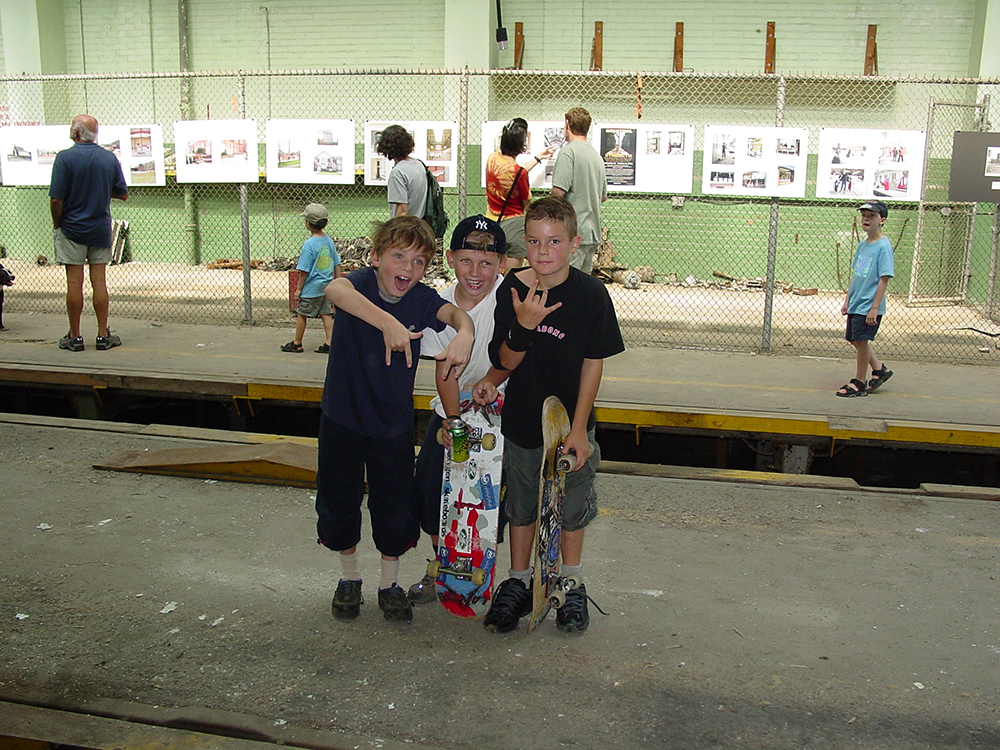 Skateboard kids at Wychwood barns photo exhibition.