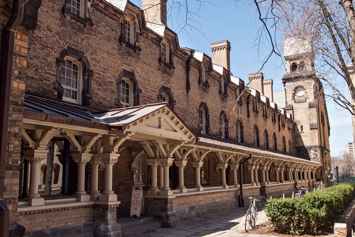 University College cloister with sign to book room.