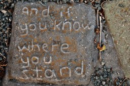 Lettered cement tile .