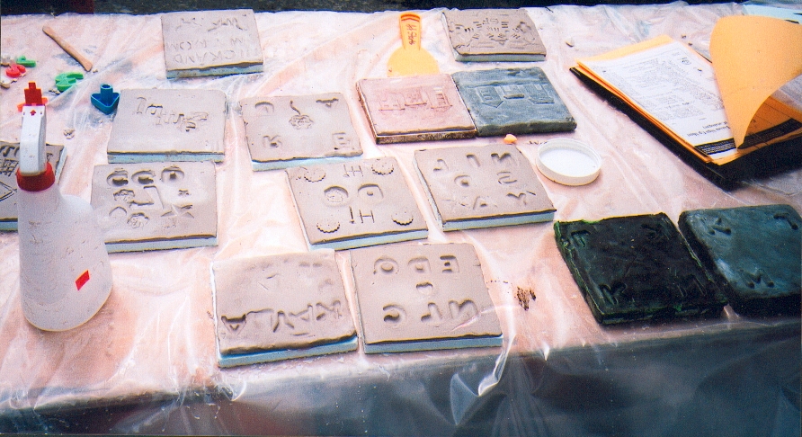 Tiles made at workshop for the Community Totem.