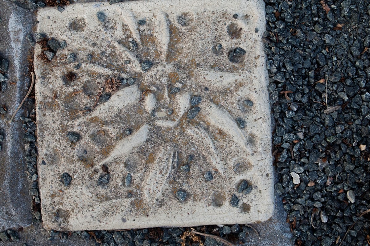 Flower head tile.