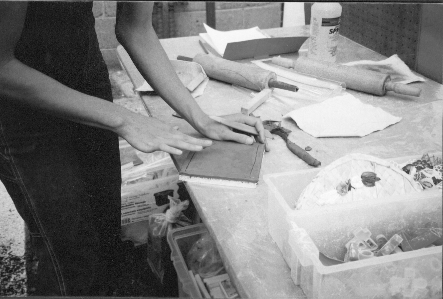 Making tiles at totem workshop.