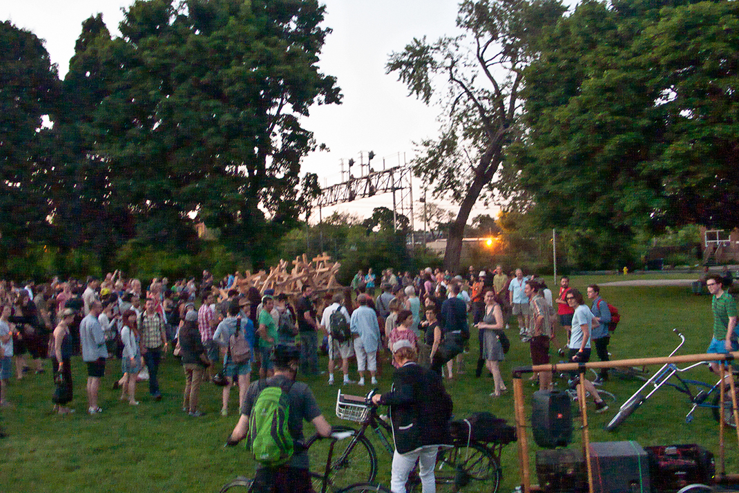 Wood sculpture in park.