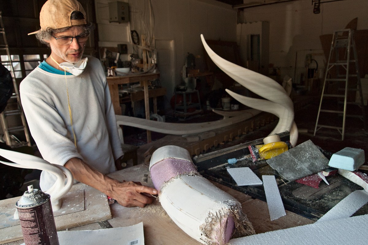 Pointing out plaster mould.