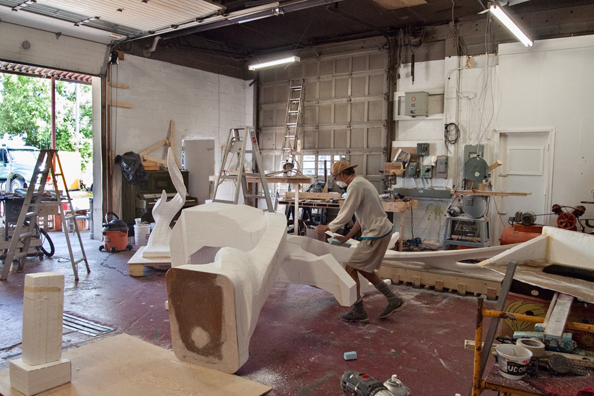 Sculptor in studio.