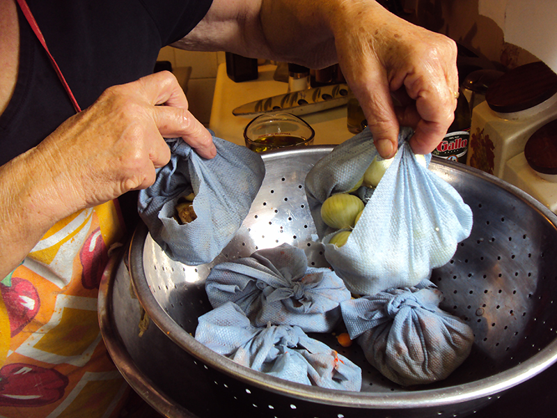 Putting vegetables into colander.