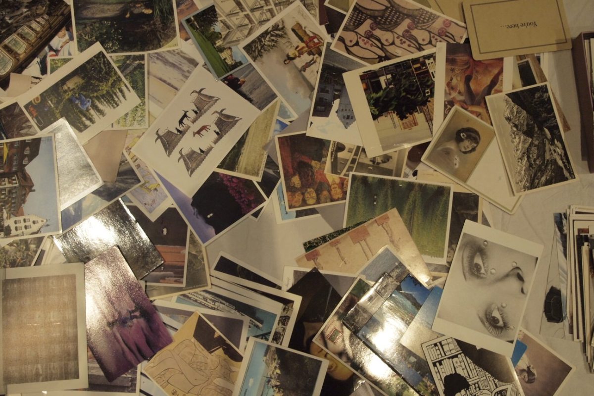 Table full of postcards.