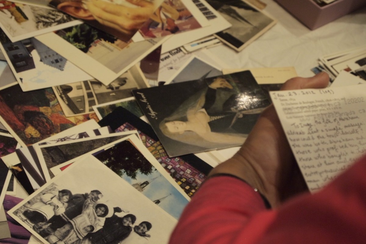 Selecting one postcard.