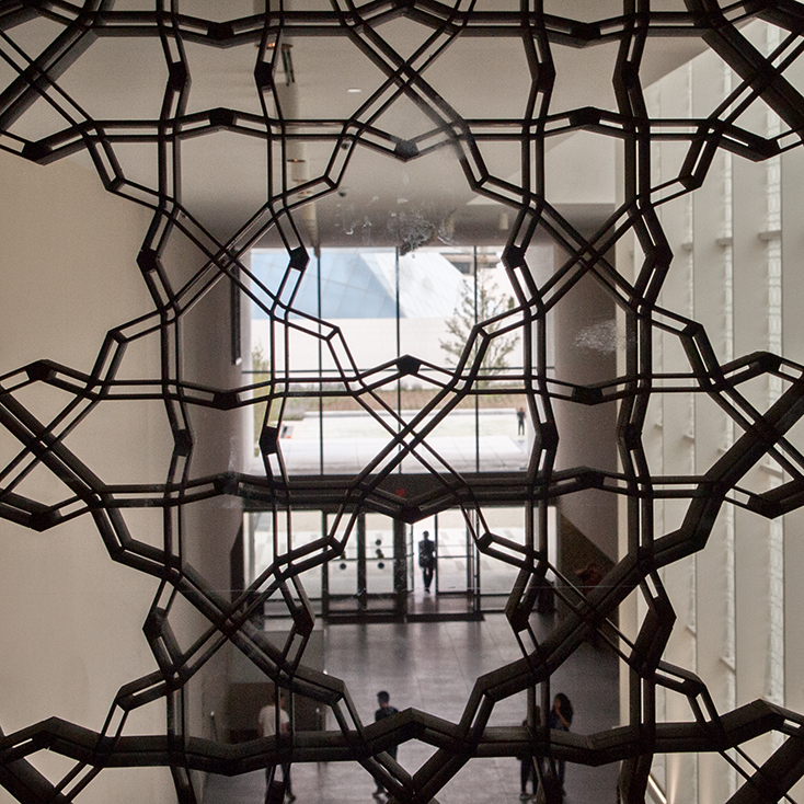 Museum interior through lattice.