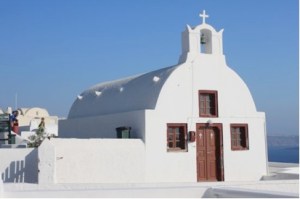 small barrel vault church in Oia, Santoroni, Greece-