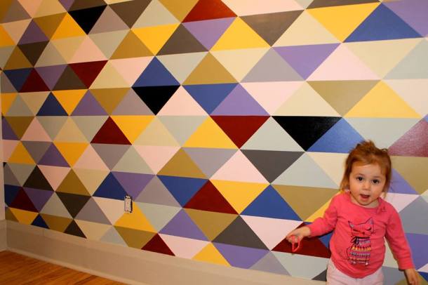 Feature wall with little girl.