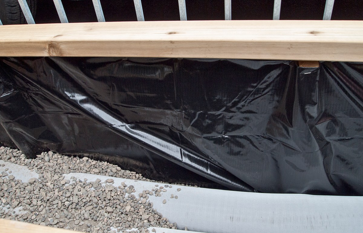 Waterproof lining of planter box.