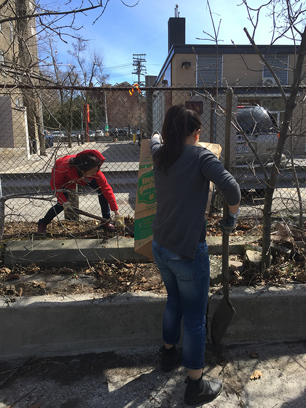 Two women cleaning up.