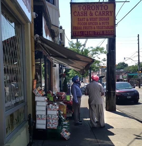 Sikh men at storefront cr