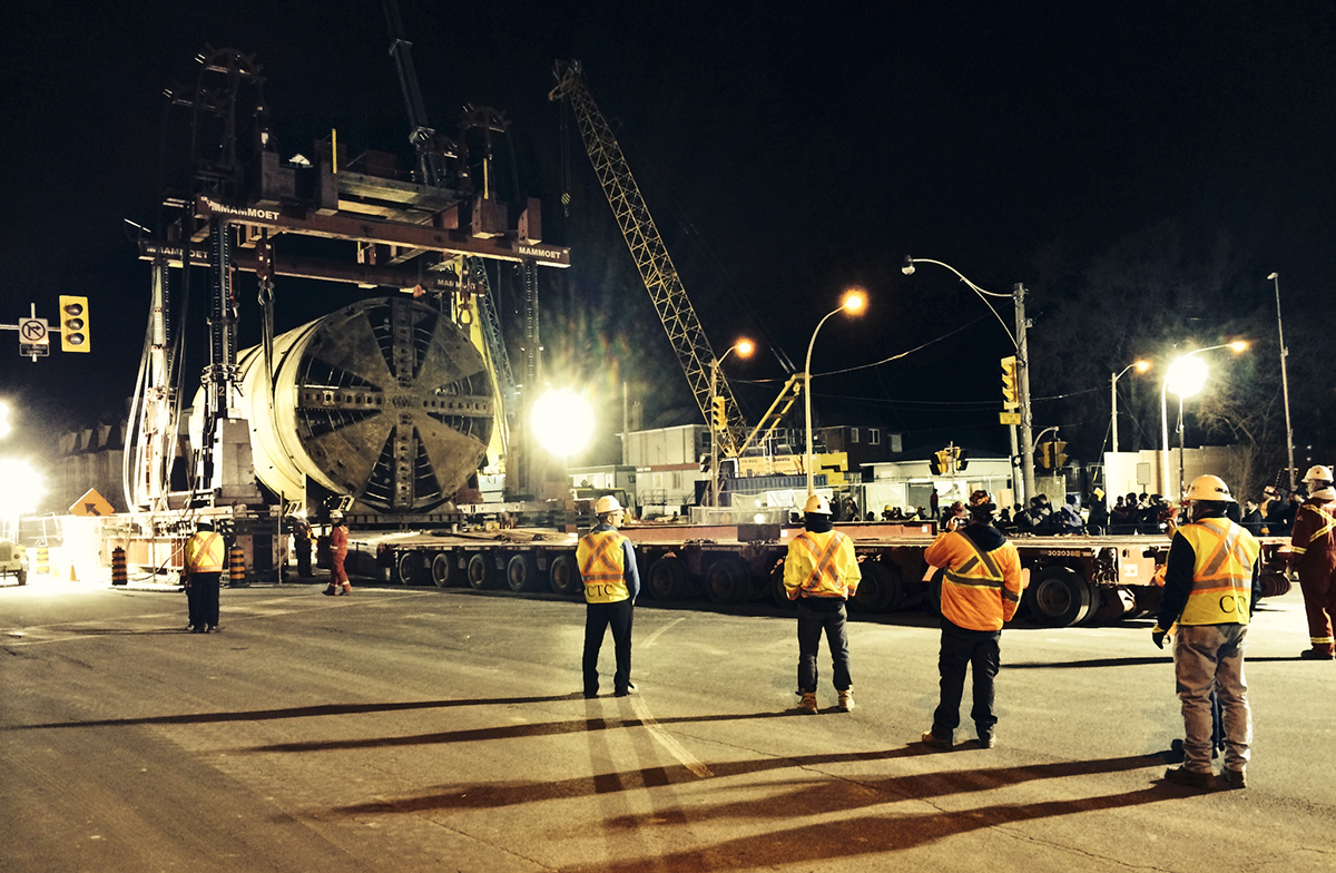 Engineers and moving tunnel machine.