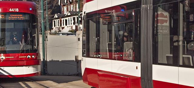 Two streetcars passing.
