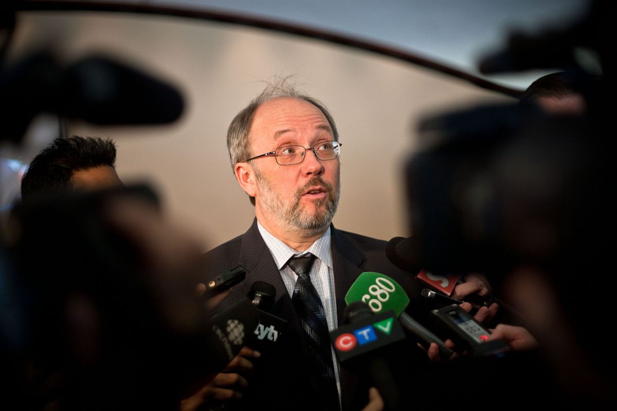 Joe Mihevc speaks to reporters.