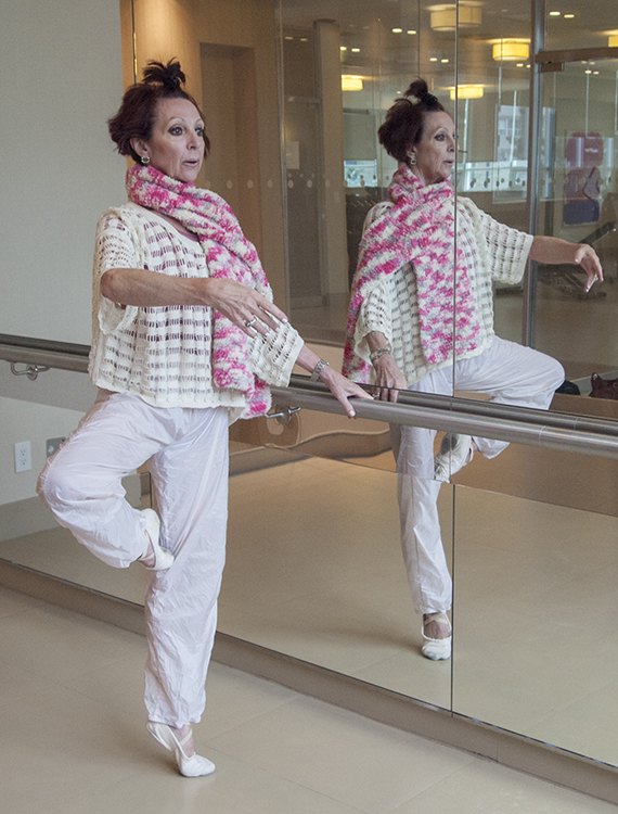 At the barre - on toes.