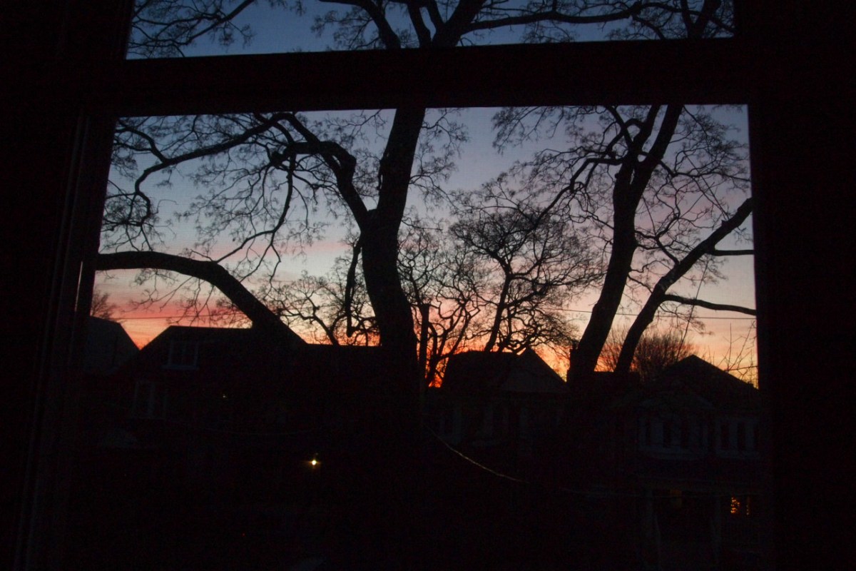 Christmas sunset through window