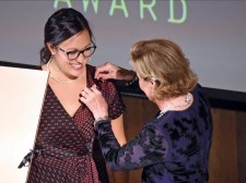 Emma receiving award.